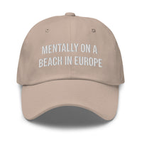 "Mentally on a Beach in Europe" Hat